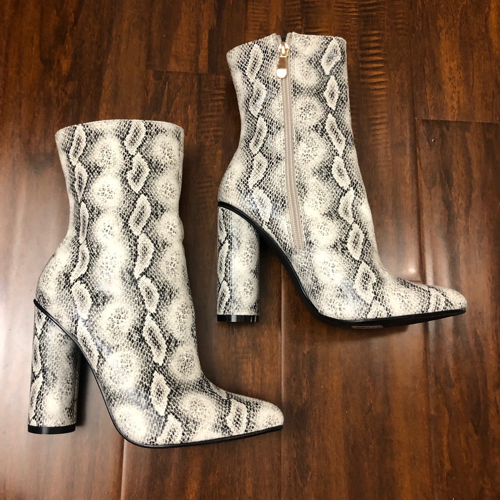 Fashion nova snake print boots, 4 inches, size 7.
